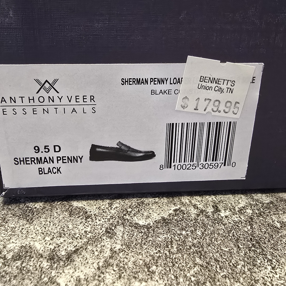 Men's black loafers, new in the box, never warn.